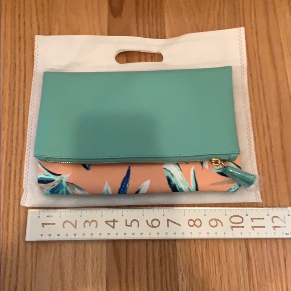 Rachel Pally reversible clutch